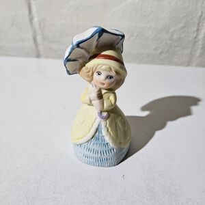 Vintage Jasco girl holding umbrella Merri Bells Figurine.